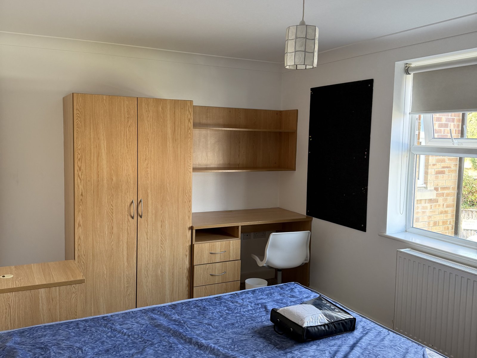 Double bedroom with fitted wardrobe in the three bedroom apartment at Conel Court